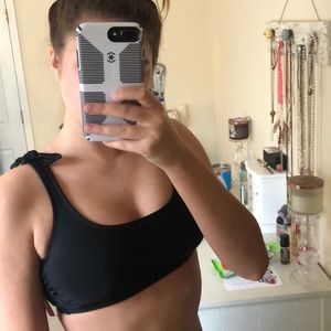 Brand new black scoop neck bikini top.